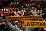 LIVERPOOL, ENGLAND - MARCH 15:  Liverpool fans on the Kop show their support with their scarves during the Barclays Premier League match between Liverpool and Portsmouth at Anfield on March 15, 2010 in Liverpool, England.  (Photo by Alex Livesey/Getty Images)