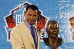 CANTON, OH - AUGUST 8: Rod Woodson poses with his bust at his induction into the Pro Football Hall of Fame during the 2009 enshrinement ceremony at Fawcett Stadium on August 8, 2009 in Canton, Ohio. (Photo by Joe Robbins/Getty Images)