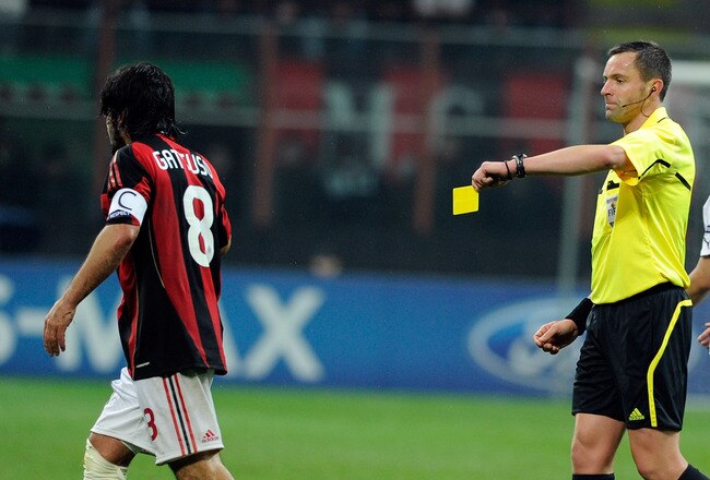 MILAN, ITALY - FEBRUARY 15:  Yellow card for Gennaro Gattuso of AC Milan during the UEFA Champions League round of 16 first leg match between AC Milan and Tottenham Hotspur at Stadio Giuseppe Meazza on February 15, 2011 in Milan, Italy.  (Photo by Claudio Villa/Getty Images)