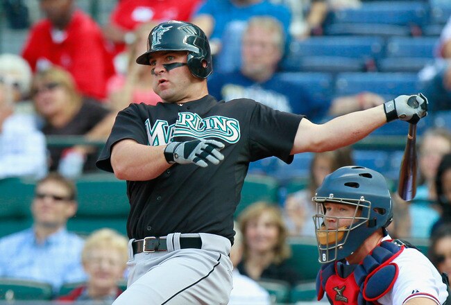 ATLANTA - SEPTEMBER 29:  Dan Uggla #6 of the Florida Marlins against David Ross #8 of the Atlanta Braves at Turner Field on September 29, 2010 in Atlanta, Georgia.  (Photo by Kevin C. Cox/Getty Images)