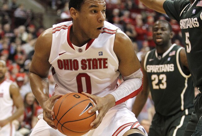COLUMBUS, OH - FEBRUARY 15: Jared Sullinger #0 of the Ohio State Buckeyes drives against Adreian Payne #5 of the Michigan State Spartans during the second half on February 15, 2011 at Value City Arena in Columbus, Ohio. Ohio State defeated Michigan State 71-61. (Photo by Gregory Shamus/Getty Images)