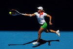 MELBOURNE, AUSTRALIA - JANUARY 21:  Justine Henin of Belgium plays a forehand in her third round match against Svetlana Kuznetsova of Russia during day five of the 2011 Australian Open at Melbourne Park on January 21, 2011 in Melbourne, Australia.  (Photo by Cameron Spencer/Getty Images)