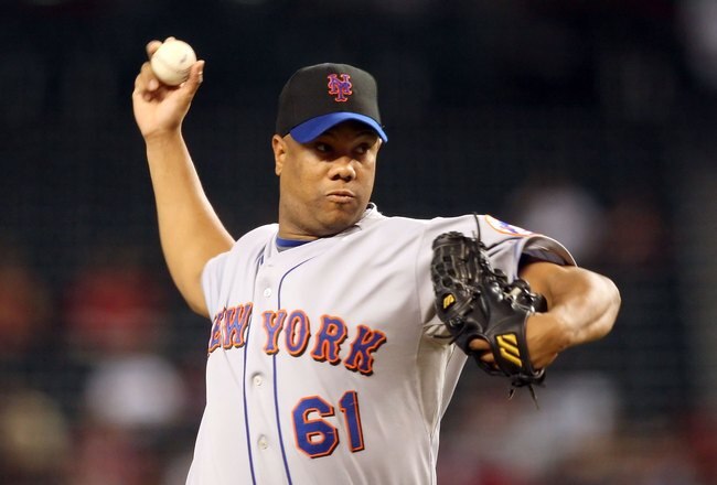 PHOENIX - AUGUST 11:  Starting pitcher Livan Hernandez #61 of the New York Mets pitches against the Arizona Diamondbacks during the major league baseball game at Chase Field on August 11, 2009 in Phoenix, Arizona. The Diamondbacks defeated the Mets 6-2.   (Photo by Christian Petersen/Getty Images)
