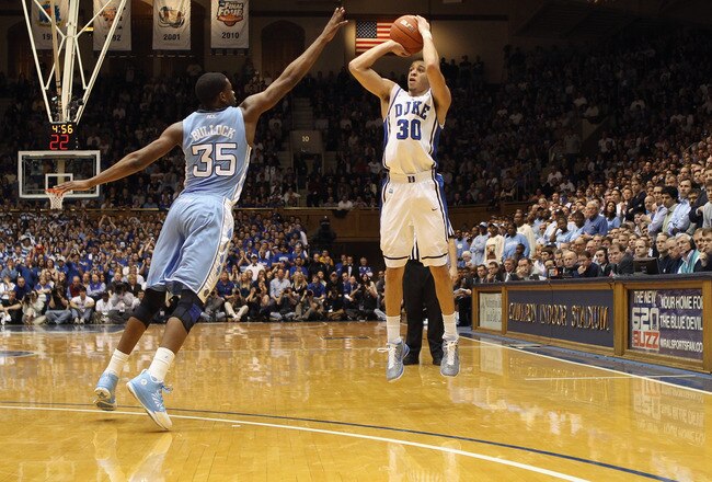 DURHAM, NC - FEBRUARY 09:  Reggie Bullock #35 of the North Carolina Tar Heels tries to stop Seth Curry #30 of the Duke Blue Devils during their game at Cameron Indoor Stadium on February 9, 2011 in Durham, North Carolina.  (Photo by Streeter Lecka/Getty Images)