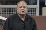 DETROIT - AUGUST 28: Mike Holmgren President of the Cleveland Browns watches the action prior to the start of the preseason game against the Detroit Lions at Ford Field on August 28, 2010 in Detroit, Michigan. (Photo by Leon Halip/Getty Images)