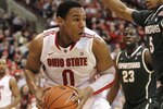 COLUMBUS, OH - FEBRUARY 15: Jared Sullinger #0 of the Ohio State Buckeyes drives against Adreian Payne #5 of the Michigan State Spartans during the second half on February 15, 2011 at Value City Arena in Columbus, Ohio. Ohio State defeated Michigan State 71-61. (Photo by Gregory Shamus/Getty Images)