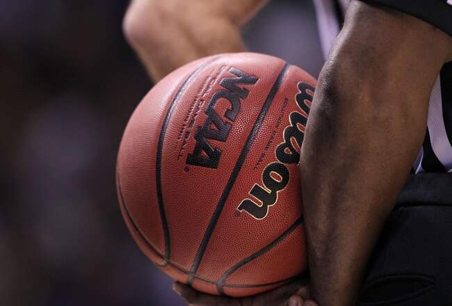 SAN JOSE, CA - MARCH 20:  An official holds the ball during the game between the Butler Bulldogs and the Murray State Racers in the second round of the 2010 NCAA men's basketball tournament at HP Pavilion on March 20, 2010 in San Jose, California.  (Photo by Jed Jacobsohn/Getty Images)