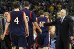 HOUSTON - MARCH 26: Head coach Randy Bennett of the St. Mary's Gaels slaps hands with his team against the Baylor Bears during the south regional semifinal of the 2010 NCAA men's basketball tournament at Reliant Stadium on March 26, 2010 in Houston, Texas. (Photo by Ronald Martinez/Getty Images)