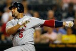 PITTSBURGH - SEPTEMBER 21:  Albert Pujols #5 of the St. Louis Cardinals hits an RBI single against the Pittsburgh Pirates during the game on September 21, 2010 at PNC Park in Pittsburgh, Pennsylvania.  (Photo by Jared Wickerham/Getty Images)