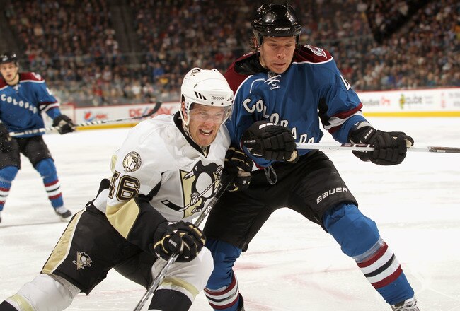 DENVER, CO - FEBRUARY 16:  Joe Vitale #46 of the Pittsburgh Penguins battles for position with Ryan Wilson #44 of the Colorado Avalanche at the Pepsi Center on February 16, 2011 in Denver, Colorado. The Penguins defeated the Avalanche 3-2 in overtime.  (Photo by Doug Pensinger/Getty Images)