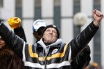 PITTSBURGH - FEBRUARY 03: Defensive Coordinator Dick LeBeau of the Pittsburgh Steelers pumps his fists during a parade to celebrate winning Super Bowl XLIII on February 3, 2009 in Pittsburgh, Pennsylvania.  (Photo by Gregory Shamus/Getty Images)