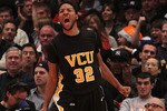 NEW YORK - NOVEMBER 26: Brandon Rozzell #32 of the Virginia Commonwealth Rams celebrates a basket  against the UCLA Bruins during their consolation game at Madison Square Garden on November 26, 2010 in New York City.  (Photo by Nick Laham/Getty Images)