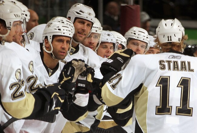 DENVER, CO - FEBRUARY 16:  Jordan Staal #11 of the Pittsburgh Penguins is congratulated by his teammates for his second period goal against the Colorado Avalanche at the Pepsi Center on February 16, 2011 in Denver, Colorado.  (Photo by Doug Pensinger/Getty Images)