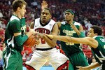LAS VEGAS, NV - JANUARY 19:  Oscar Bellfield #0 of the UNLV Rebels loses the ball as (L-R) Wes Eikmeier #2, Andy Ogide #32 and Dorian Green #22 of the Colorado State Rams defend during their game at the Thomas & Mack Center January 19, 2011 in Las Vegas, Nevada.  (Photo by Ethan Miller/Getty Images)