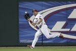 ST. LOUIS, MISSOURI - APRIL 12:  Jim Edmonds #15 of the St. Louis Cardinals makes the catch for the last out of the game against the Milwaukee Brewers on April 12, 2006 at Busch Stadium in St. Louis, Missouri. The Cardinals defeated the Brewers 8-3.  (Photo by Elsa/Getty Images)