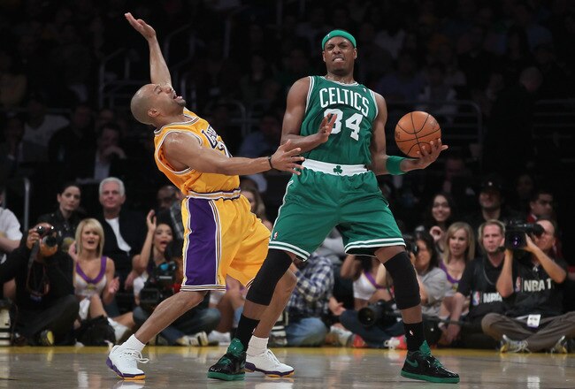 LOS ANGELES, CA - JANUARY 30:  Paul Pierce #34 of the Boston Celtics is defended by Derek Fisher #2 of the Los Angeles Lakers in the first half at Staples Center on January 30, 2011 in Los Angeles, California. The Celtics defeated the Lakers 109-96.  (Photo by Jeff Gross/Getty Images)