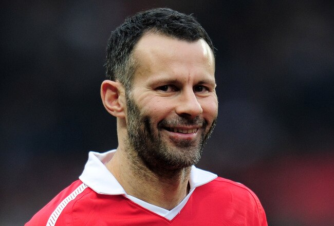 MANCHESTER, ENGLAND - JANUARY 22:  Ryan Giggs of Manchester United smiles prior to the Barclays Premier League match between Manchester United and Birmingham City at Old Trafford on January 22, 2011 in Manchester, England.  (Photo by Shaun Botterill/Getty Images)