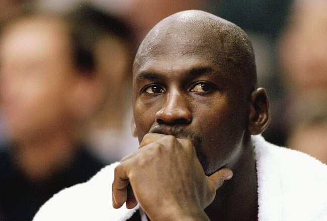 21 Nov 1997:  Guard Michael Jordan of the Chicago Bulls looks on during a game against the Los Angeles Clippers at the Los Angeles Sports Arena in Los Angeles, California.  The Bulls won the game 111-102 in double-overtime. Mandatory Credit: Todd Warshaw