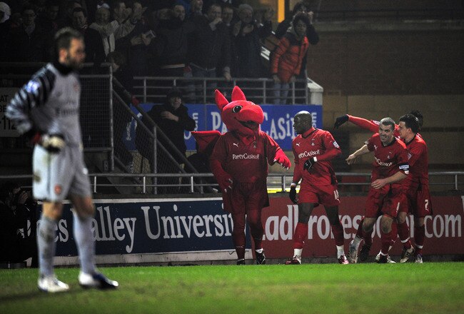 LONDON, ENGLAND - FEBRUARY 20:  Jonathan Tehoue of Leyton Orient celebrates his goal with team mates during the FA Cup sponsored by E.ON 5th Round match between Leyton Orient and Arsenal at the Matchroom Stadium on February 20, 2011 in London, England.  (Photo by Shaun Botterill/Getty Images)