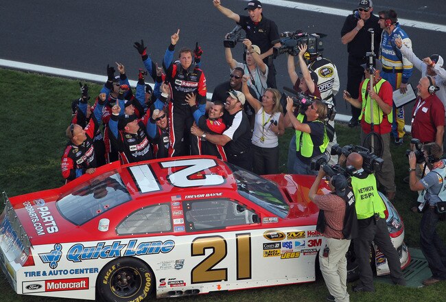DAYTONA BEACH, FL - FEBRUARY 20:  Trevor Bayne, driver of the #21 Motorcraft/Quicklane Ford, celebrates after winning the NASCAR Sprint Cup Series Daytona 500 at Daytona International Speedway on February 20, 2011 in Daytona Beach, Florida.  (Photo by Jamie Squire/Getty Images)