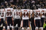 BALTIMORE - DECEMBER 20:  The Chicago Bears defense huddles during the game against the Baltimore Ravens at M&T Bank Stadium on December 20, 2009 in Baltimore, Maryland. The Ravens defeated the Bears 31-7. (Photo by Larry French/Getty Images)