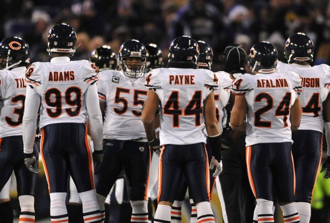 BALTIMORE - DECEMBER 20:  The Chicago Bears defense huddles during the game against the Baltimore Ravens at M&T Bank Stadium on December 20, 2009 in Baltimore, Maryland. The Ravens defeated the Bears 31-7. (Photo by Larry French/Getty Images)