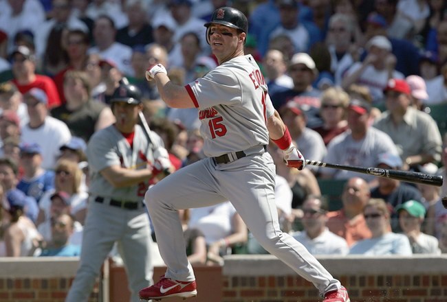 CHICAGO - APRIL 22: Jim Edmonds #15 of the St. Louis Cardinals swings at the pitch against the Chicago Cubs on April 22, 2007 at Wrigley Field in Chicago, Illinois. (Photo by Jonathan Daniel/Getty Images)