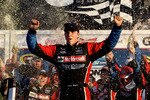 DAYTONA BEACH, FL - FEBRUARY 20:  Trevor Bayne, driver of the #21 Motorcraft/Quick Lane Ford, celebrates in Victory Lane after winning the NASCAR Sprint Cup Series Daytona 500 at Daytona International Speedway on February 20, 2011 in Daytona Beach, Florida.  (Photo by Matthew Stockman/Getty Images for NASCAR)