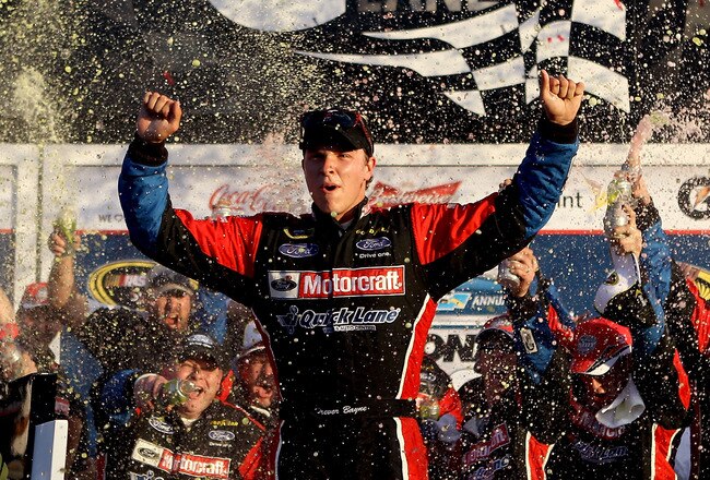 DAYTONA BEACH, FL - FEBRUARY 20:  Trevor Bayne, driver of the #21 Motorcraft/Quick Lane Ford, celebrates in Victory Lane after winning the NASCAR Sprint Cup Series Daytona 500 at Daytona International Speedway on February 20, 2011 in Daytona Beach, Florida.  (Photo by Matthew Stockman/Getty Images for NASCAR)
