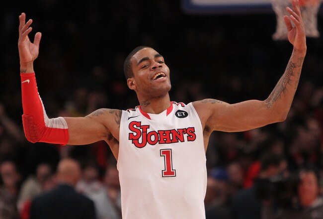 NEW YORK, NY - JANUARY 30: D.J. Kennedy #1 of the St. John's Red Storm celebrates the win against the Duke Blue Devils  at Madison Square Garden on January 30, 2011 in New York City.  (Photo by Nick Laham/Getty Images)