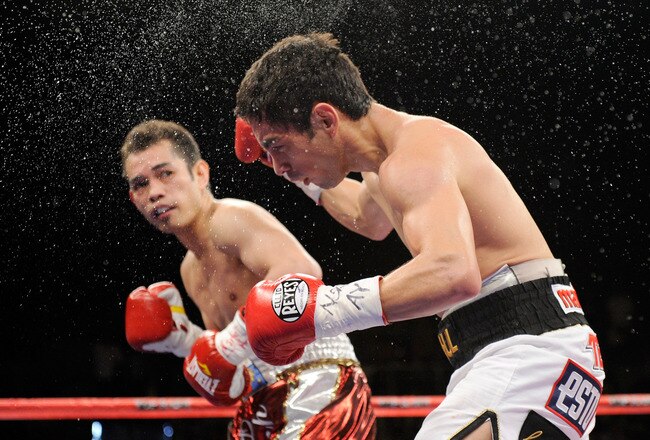 LAS VEGAS, NV - FEBRUARY 19:  Nonito Donaire of the Philippines watches Fernando Montiel of Mexico start to fall to the canvas after he hit him in the second round of their WBC/WBO bantamweight championship bout at the Mandalay Bay Events Center February 19, 2011 in Las Vegas, Nevada. Donaire won by TKO in the second round.  (Photo by Ethan Miller/Getty Images)