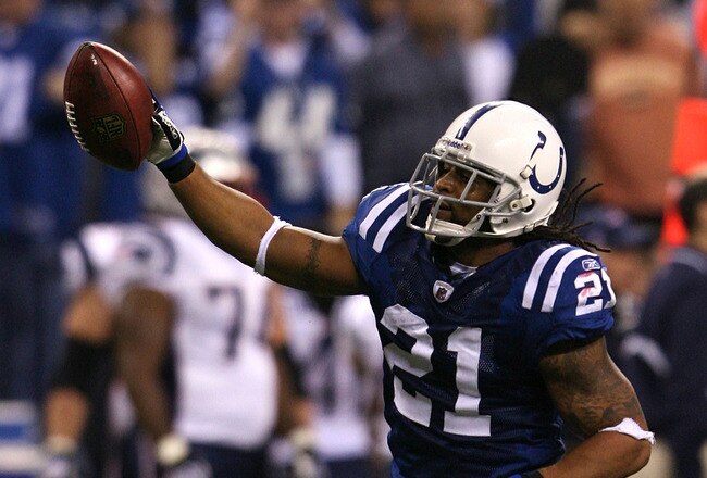 INDIANAPOLIS - NOVEMBER 02:  Bob Sanders #21 of the Indianapolis Colts celebrates after he intercepted  a pass in the fourth quarter against the New England Patriots at Lucas Oil Stadium on November 2, 2008 in Indianapolis, Indiana.  (Photo by Andy Lyons/Getty Images)