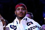 LOS ANGELES, CA - FEBRUARY 20:  Carmelo Anthony #15 of the Denver Nuggets and the Western Conference looks on after the Western Conference 148-143 victory in the 2011 NBA All-Star Game at Staples Center on February 20, 2011 in Los Angeles, California. NOTE TO USER: User expressly acknowledges and agrees that, by downloading and or using this photograph, User is consenting to the terms and conditions of the Getty Images License Agreement.  (Photo by Kevork Djansezian/Getty Images)