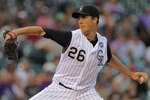 DENVER - SEPTEMBER 13:  Starting pitcher Jeff Francis #26 of the Colorado Rockies delivers against the San Diego Padres at Coors Field on September 13, 2010 in Denver, Colorado.  (Photo by Doug Pensinger/Getty Images)