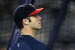 NEW YORK - OCTOBER 09:  Joe Mauer #7 of the Minnesota Twins looks on during batting practice against the New York Yankees during Game Three of the ALDS part of the 2010 MLB Playoffs at Yankee Stadium on October 9, 2010 in the Bronx borough of New York City.  (Photo by Chris McGrath/Getty Images)