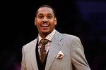 LOS ANGELES, CA - FEBRUARY 18:  Carmelo Anthony of the Denver Nuggets reacts as he takes his seat to watch the T-Mobile Rookie Challenge and Youth Jam at Staples Center on February 18, 2011 in Los Angeles, California.  (Photo by Kevork Djansezian/Getty Images)