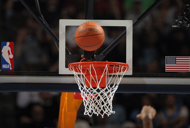 DENVER - NOVEMBER 16:  A detail photo of the ball as it falls through the rim as the Denver Nuggets face the New York Knicks at the Pepsi Center on November 16, 2010 in Denver, Colorado. The Nuggets defeated the Knicks 120-118. NOTE TO USER: User expressly acknowledges and agrees that, by downloading and/or using this Photograph, User is consenting to the terms and conditions of the Getty Images License Agreement.  (Photo by Doug Pensinger/Getty Images)