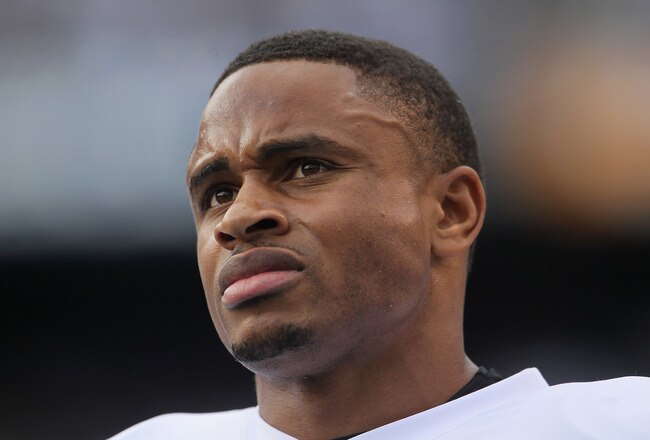 SAN DIEGO - DECEMBER 05:  Nnamdi Asomugha #21 the Oakland Raiders looks on from the sideline against the San Diego Chargers at Qualcomm Stadium on December 5, 2010 in San Diego, California. The Raiders defeated the Chargers 28-13.  (Photo by Jeff Gross/Getty Images)
