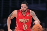 LOS ANGELES, CA - FEBRUARY 20:  Deron Williams #8 of the Utah Jazz and the Western Conference moves the ball in the 2011 NBA All-Star Game at Staples Center on February 20, 2011 in Los Angeles, California. NOTE TO USER: User expressly acknowledges and agrees that, by downloading and or using this photograph, User is consenting to the terms and conditions of the Getty Images License Agreement.  (Photo by Jeff Gross/Getty Images)