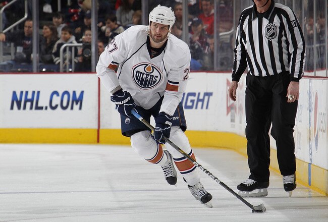 COLUMBUS, OH - FEBRUARY 05: Dustin Penner #27 of the Edmonton Oilers skates with the puck against the Columbus Blue Jackets at Nationwide Arena on February 5, 2011 in Columbus, Ohio.  (Photo by Gregory Shamus/Getty Images)