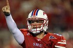 DALLAS - SEPTEMBER 24:  Quarterback Kyle Padron #2 of the SMU Mustangs celebrates a touchdown in the third quarter against the TCU Horned Frogs at Gerald J. Ford Stadium on September 24, 2010 in Dallas, Texas.  (Photo by Ronald Martinez/Getty Images)