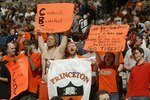 DENVER - MARCH 18:  Fans of the Princeton Tigers cheer during a timeout against the Texas Longhorns during their first round game of the NCAA Division I Men's Basketball Tournament March 18, 2004 at the Pepsi Center in Denver, Colorado.  (Photo by Brian Bahr/Getty Images)