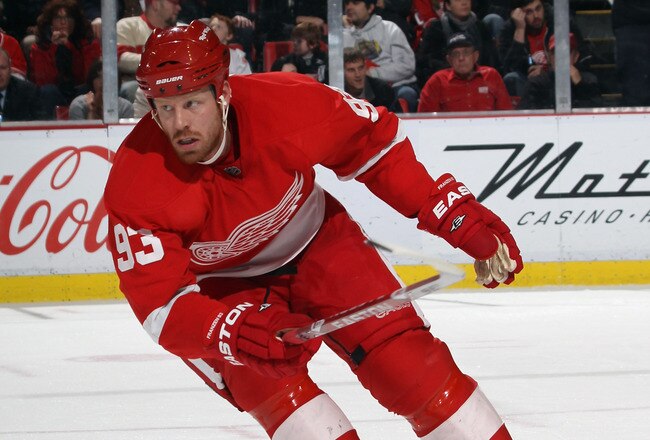 DETROIT, MI - DECEMBER 08:  Johan Franzen #93 of the Detroit Red Wings skates against the Nashville Predators at the Joe Louis Arena on December 8, 2010 in Detroit, Michigan. The Predators defeated the Red Wings 3-2.  (Photo by Bruce Bennett/Getty Images)