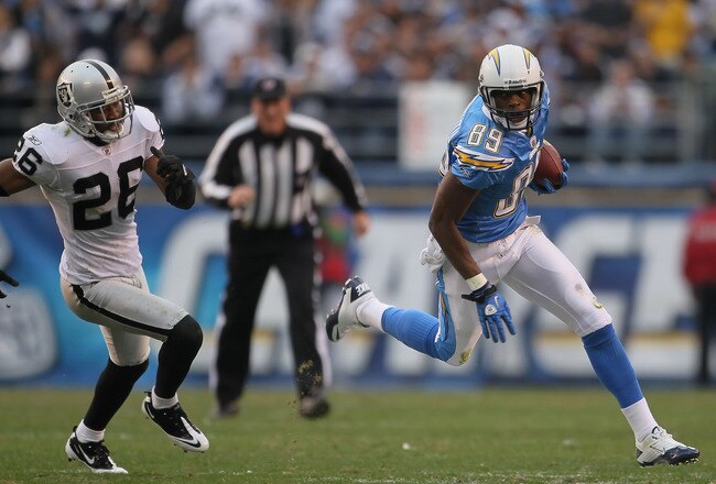 SAN DIEGO - DECEMBER 05:  Seyi Ajirotutu #89 of the San Diego Chargers is pursued by Stanford Routt #26 of the Oakland Raiders at Qualcomm Stadium on December 5, 2010 in San Diego, California. The Raiders defeated the Chargers 28-13.  (Photo by Jeff Gross/Getty Images)