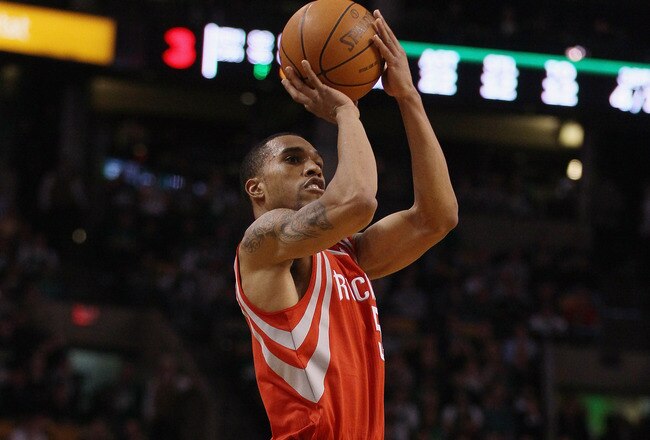 BOSTON, MA - JANUARY 10:  Courtney Lee #5 of the Houston Rockets takes a shot in the second half against the Boston Celtics on January 10, 2011 at the TD Garden in Boston, Massachusetts.  The Rockets defeated the Celtics 108-102. NOTE TO USER: User expressly acknowledges and agrees that, by downloading and/or using this Photograph, User is consenting to the terms and conditions of the Getty Images License Agreement.  (Photo by Elsa/Getty Images)
