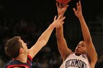 PROVIDENCE, RI - MARCH 18: Kevin Anderson #14 of the Richmond Spiders shoots a basket against the Saint Mary's Gaels during the first round of the 2010 NCAA men's tournament at Dunkin' Donuts Center on March 18, 2010 in Providence, Rhode Island. (Jim Rogash/Getty Images)