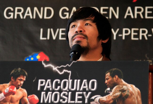 NEW YORK, NY - FEBRUARY 14:  Manny Pacquiao addresses the media at a press conference to promote his upcoming fight with Shane Mosley at The Lighthouse at Chelsea Piers on February 14, 2011 in New York City.  (Photo by Chris Trotman/Getty Images)