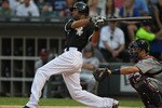 CHICAGO - AUGUST 10: Alex Rios #51 of the Chicago White Sox hits the ball against the Minnesota Twins at U.S. Cellular Field on August 10, 2010 in Chicago, Illinois. The Twins defeated the White Sox 12-6. (Photo by Jonathan Daniel/Getty Images)
