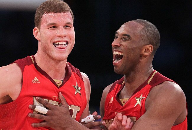 LOS ANGELES, CA - FEBRUARY 20:  Blake Griffin #32 of the Los Angeles Clippers and the Western Conference and Kobe Bryant #24 of the Los Angeles Lakers and the Western Conference react in the second half of the 2011 NBA All-Star Game at Staples Center on February 20, 2011 in Los Angeles, California. NOTE TO USER: User expressly acknowledges and agrees that, by downloading and or using this photograph, User is consenting to the terms and conditions of the Getty Images License Agreement.  (Photo by Jeff Gross/Getty Images)