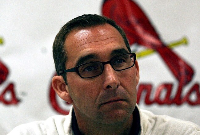 JUPITER, FL - FEBRUARY 16:  General Manager John Mozeliak of the St. Louis Cardinals speaks at a press conference at Roger Dean Stadium on February 16, 2011 in Jupiter, Florida.  (Photo by Marc Serota/Getty Images)
